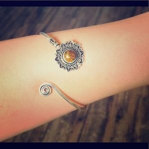 Bracelet cuff with bursting sun detail